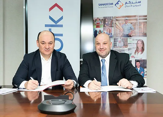 Sanadcom for Business Finance and Network International - Jordan sign  Cooperation Agreement to provide new service