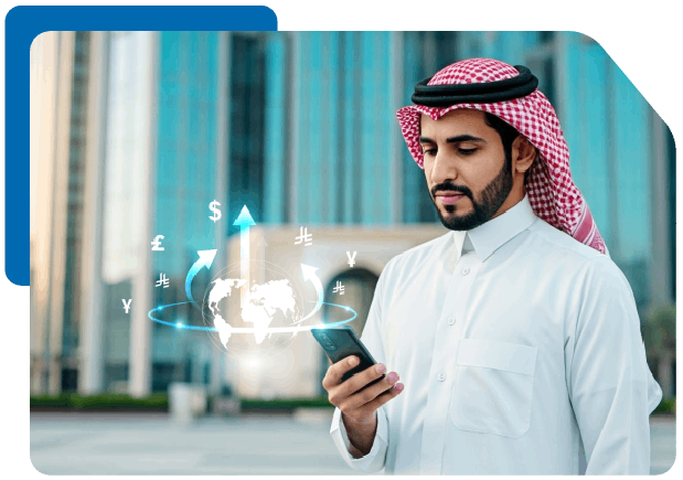 Saudi man using laptop and holding a Network card with a holographic world map showing global currency exchange connections.