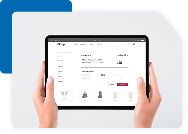 Hands holding a tablet showing an eShop checkout page using Network as the payment gateway for a 250 SAR transaction.