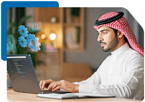 Man works on laptop with holographic gears, symbolizing AI and data analytics.